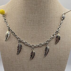 Silver and Gold Feather Charm Necklace